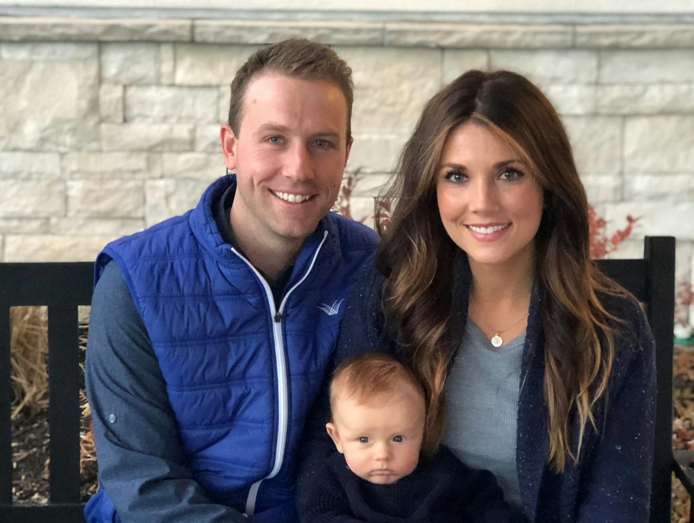 Kathryn Anderson, a senior manager at PricewaterhouseCoopers, took advantage of PwC's enhanced paid family leave, including a transition period during which she worked a 60% schedule but got paid 100% of her salary. Pictured here with husband (FOLLOWING UP TO GET NAME) and son Emmett. (Photo provided by Anderson)