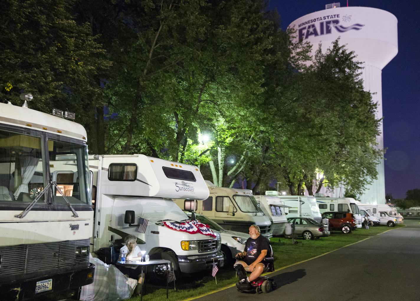 Mark Swanson of Bloomington chatted with his neighbors at the State Fair campground, a family tradition for many who stay there.