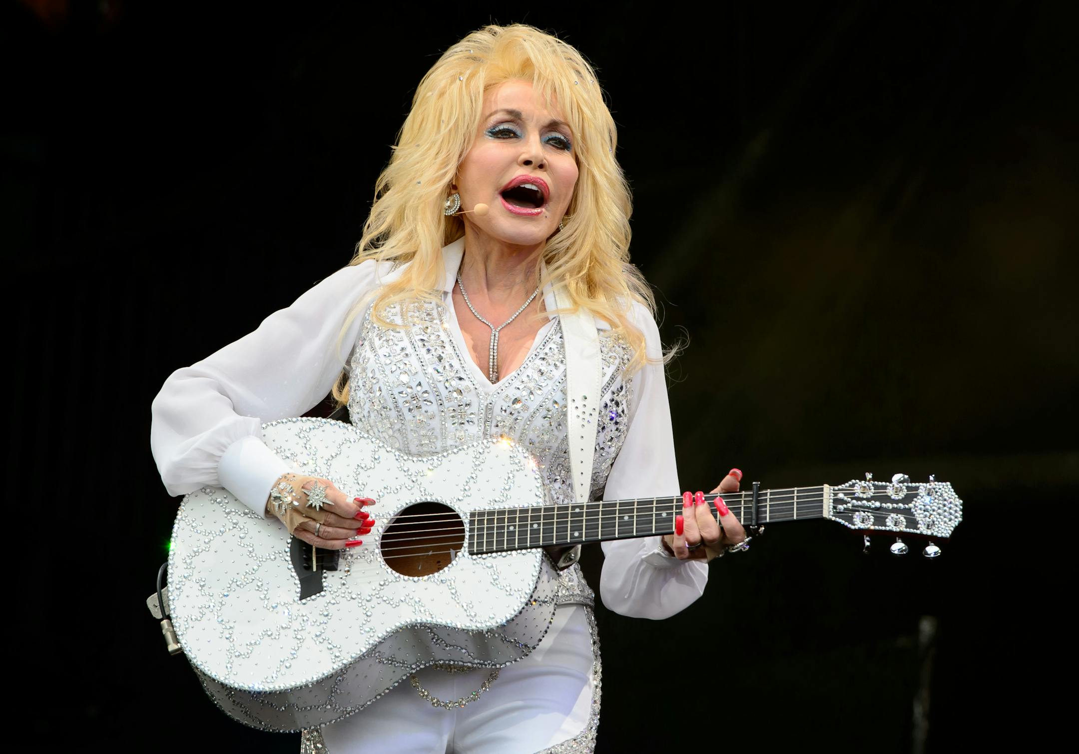 Dolly Parton performs at Glastonbury music festival, England, Sunday.
