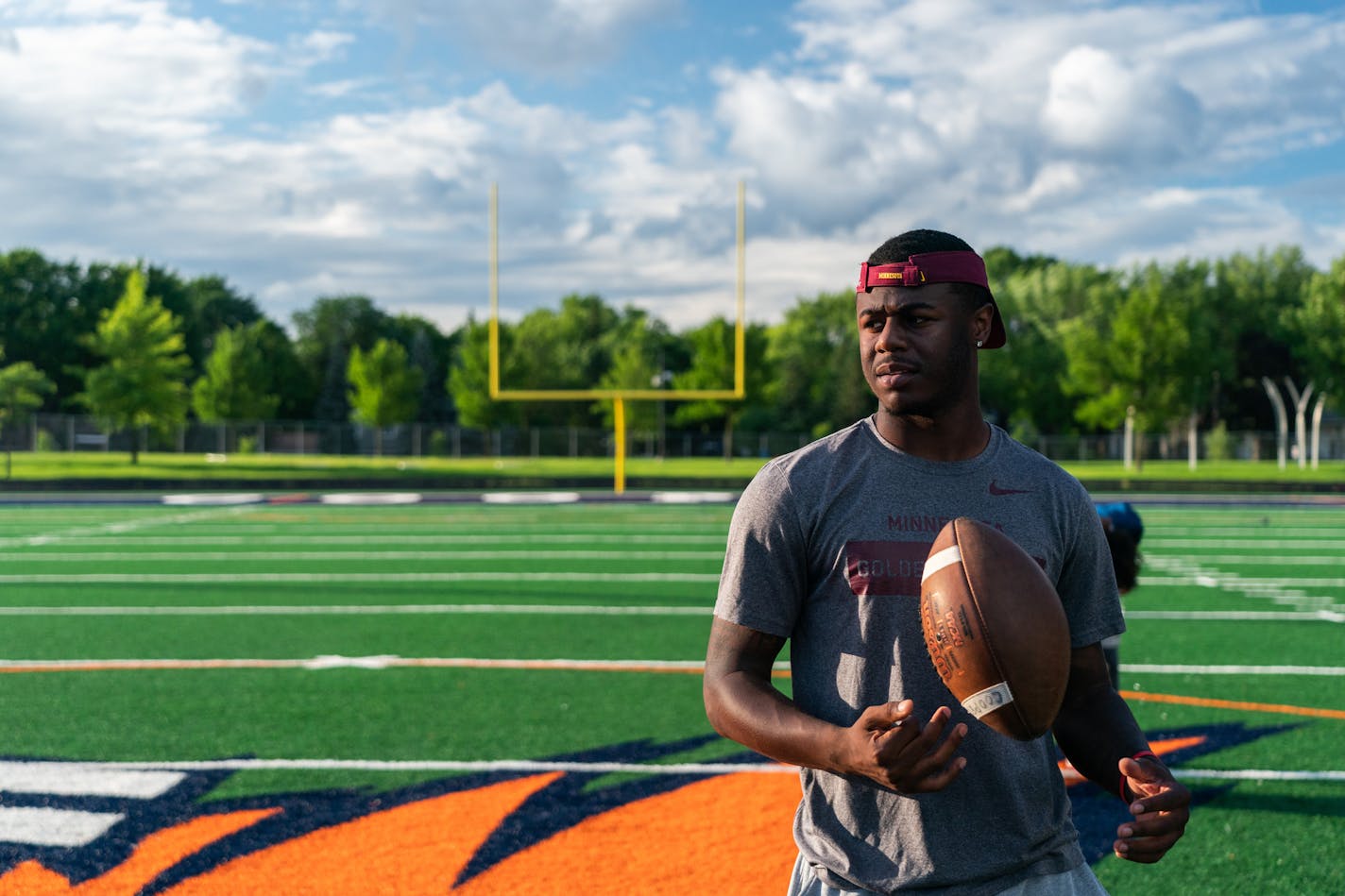 Coaches say Johnson regularly attends practices with is old high school team in his downtime. ] MARK VANCLEAVE ¥ Minnesota Gophers wide receiver Tyler Johnson watched the Minneapolis North high school football team practice against other area teams during a scrimmage at Robbinsdale Cooper High School in New Hope on Wednesday, Jul 10, 2019.