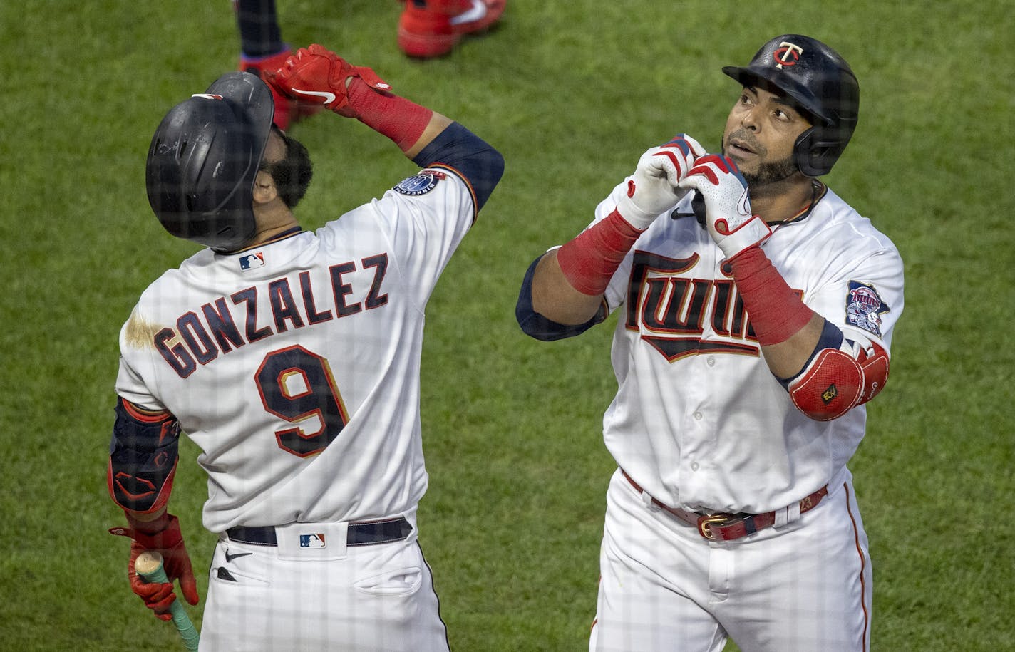 Minnesota Twins DH Nelson Cruz celebrated with Marwin Gonzalez after hitting a solo homerun in the fourth inning. ] CARLOS GONZALEZ • cgonzalez@startribune.com – Minneapolis, MN – August 17, 2020, Target Field, MLB, Minnesota Twins vs. Kansas City Royals