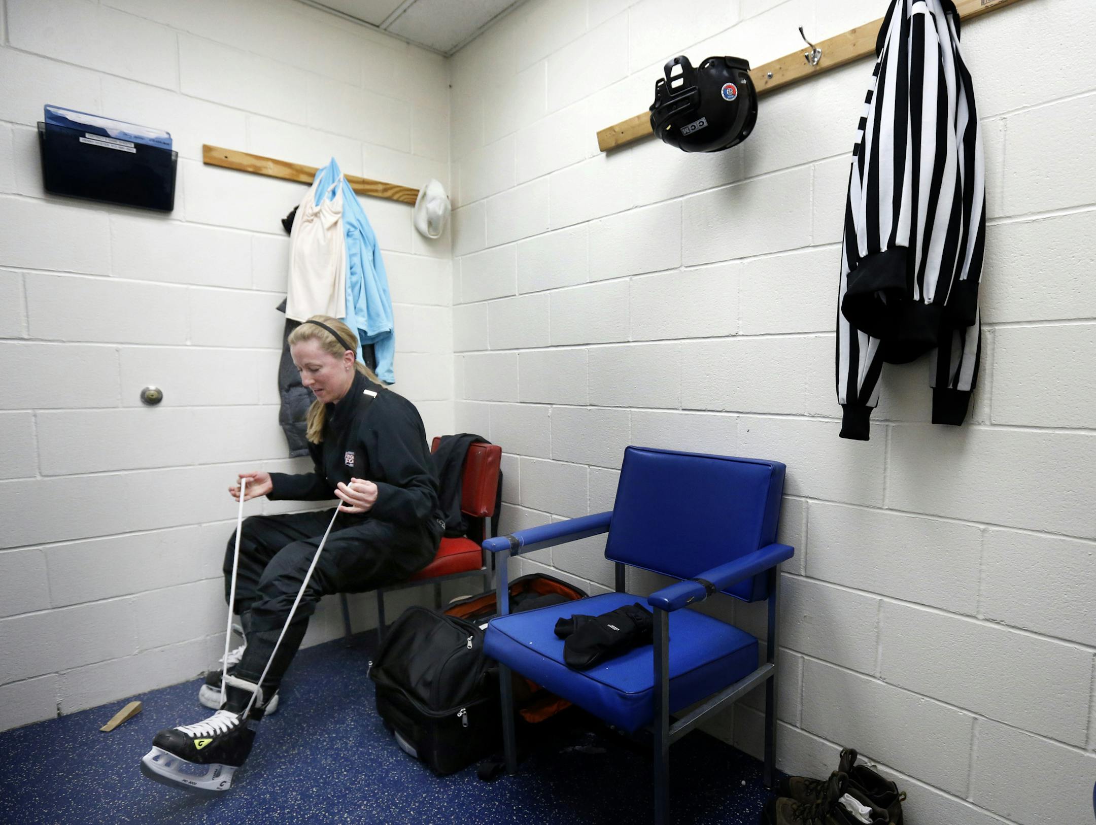 Hockey referee Alicia Hanrahan prepared to officiate a game at the Rosemount Community Center on Tuesday. Alicia Hanrahan of South St. Paul, will officiate the women hockey tournament at the Sochi Olympics. ] CARLOS GONZALEZ cgonzalez@startribune.com - January 28, 2013, Rosemount Community Center, The Minnesota connection at the Olympics includes more than just the 25 athletes. In addition, a number of others from our state will be involved in the Winter Games, in jobs that will put them on the