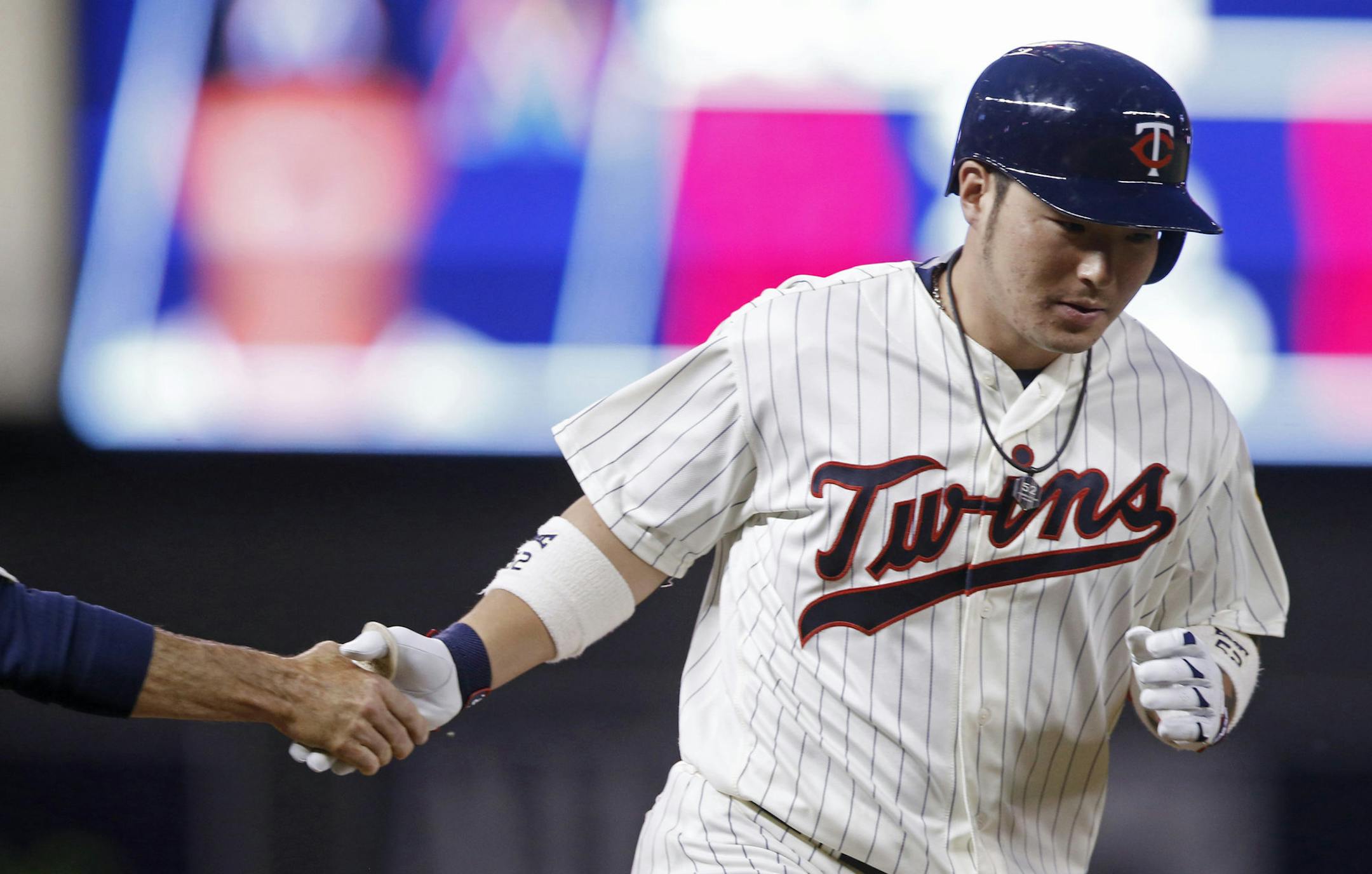 Minnesota Twins' Byung Ho Park, of South Korea, rounds the bases on a solo home off Miami Marlins starting Wei-Yin Chen during the sixth inning of a baseball game Wednesday, June 8, 2016, in Minneapolis. (AP Photo/Jim Mone)