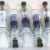 FILE - This Saturday, Oct. 17, 2020 file photo shows influenza vaccine syringes at the L.A. Care Health Plan and Blue Shield of California Promise Health Plan's Community Resource Center's Free Drive-Thru vaccination event in Los Angeles. February is usually the peak of flu season, with doctors' offices and hospitals packed with suffering patients. But not in 2021. Flu has virtually disappeared, with reports coming in at far lower levels than anything seen in decades. (AP Photo/Damian Dovarganes)