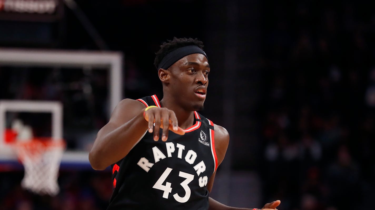 Toronto Raptors forward Pascal Siakam brings the ball up court during the first half of an NBA basketball game, Friday, Jan. 31, 2020, in Detroit. (AP Photo/Carlos Osorio)