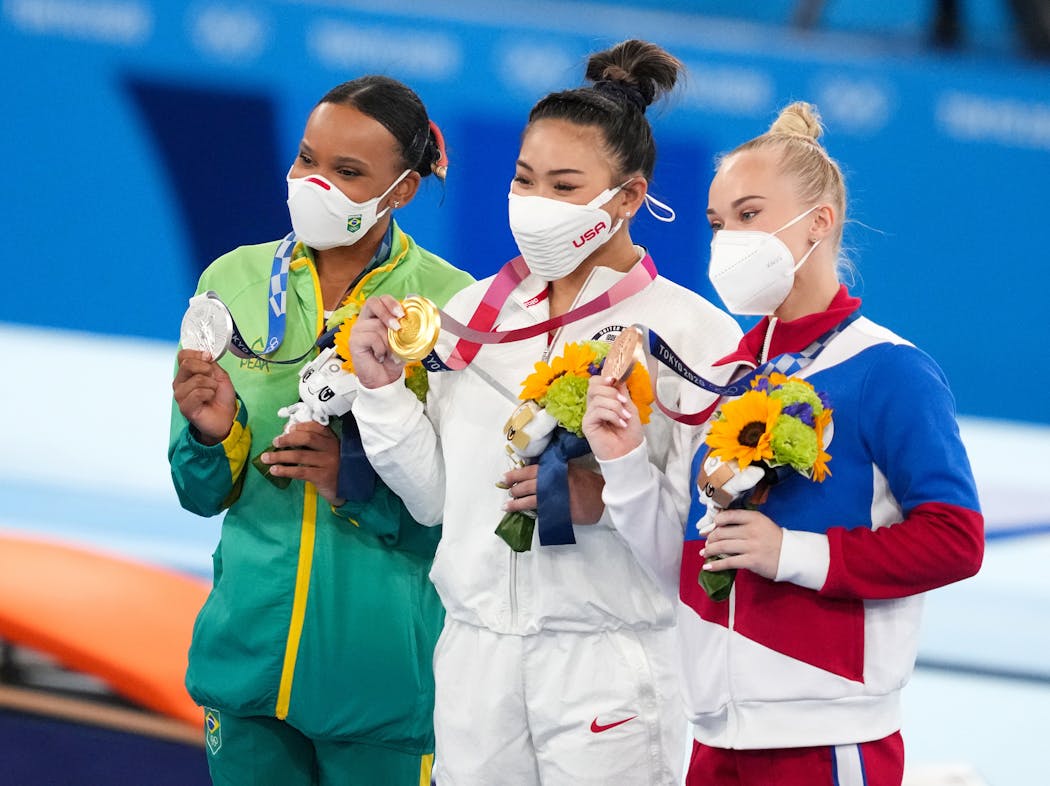 Masks on the medal stand were a sign of the times at the Tokyo Olympics.