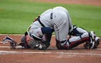Twins catcher Mitch Garver was in pain after being struck by a foul tip on Tuesday in Baltimore.