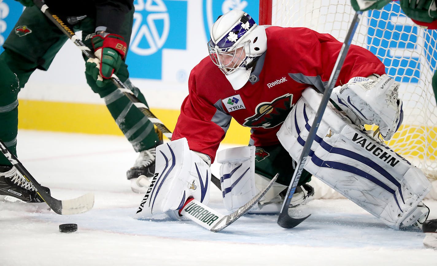 Goaltender Alex Stalock made a save during the first day of training camp last September. He will star Thursday's game against Ottawa.