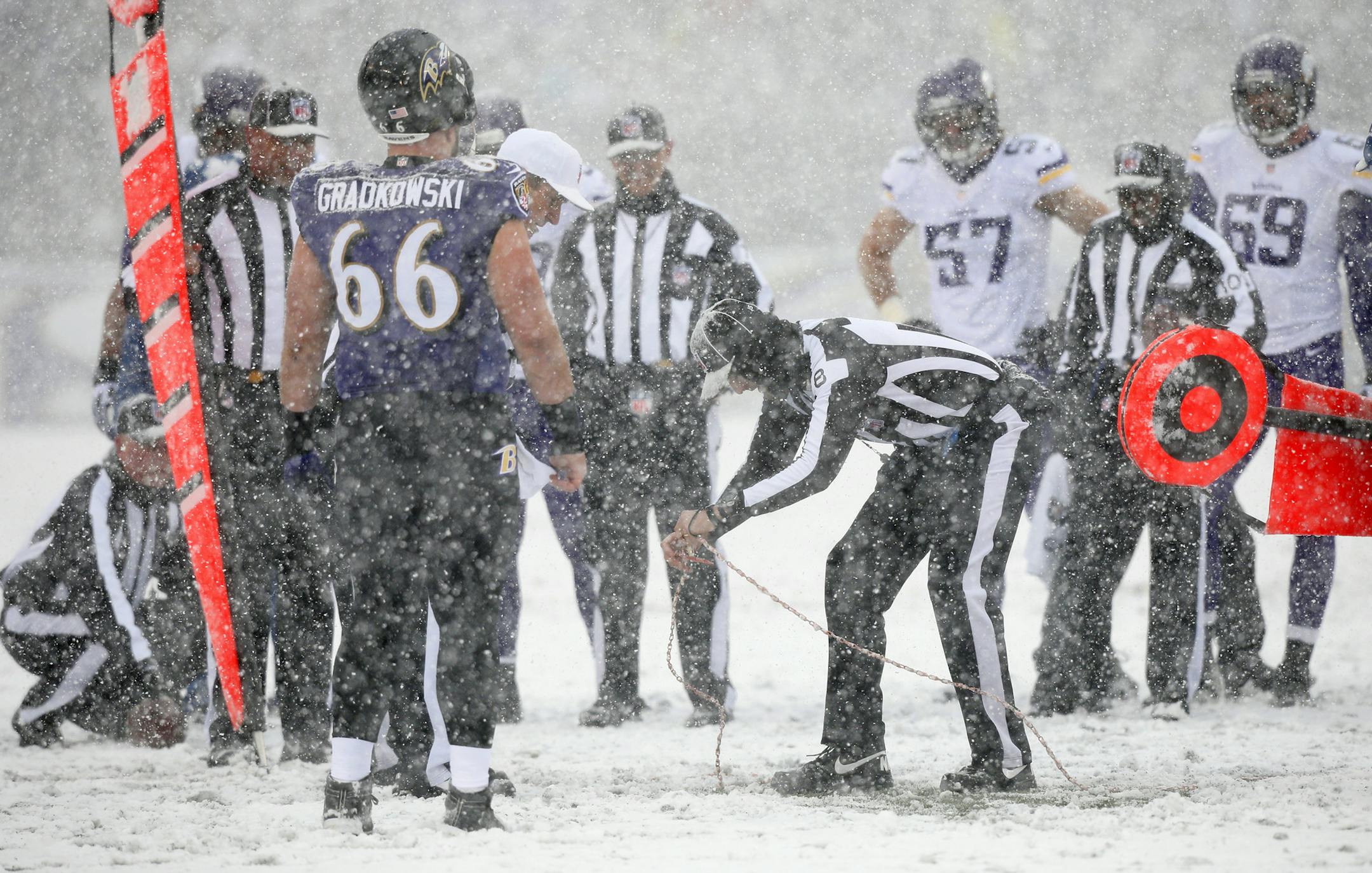 Early in the game, officials had a tough time marking the ball on the field because of the deep snow. ] M&T BANK STADIUM - Minnesota Vikings -vs- Baltimore Ravens Baltimore, MD 12/08//2013