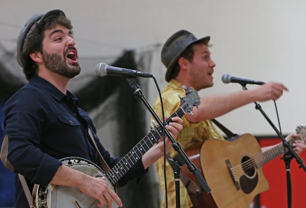 The Okee Dokee Brothers, Justin Lansing, left, and Joe Mailander, perform in 2014.