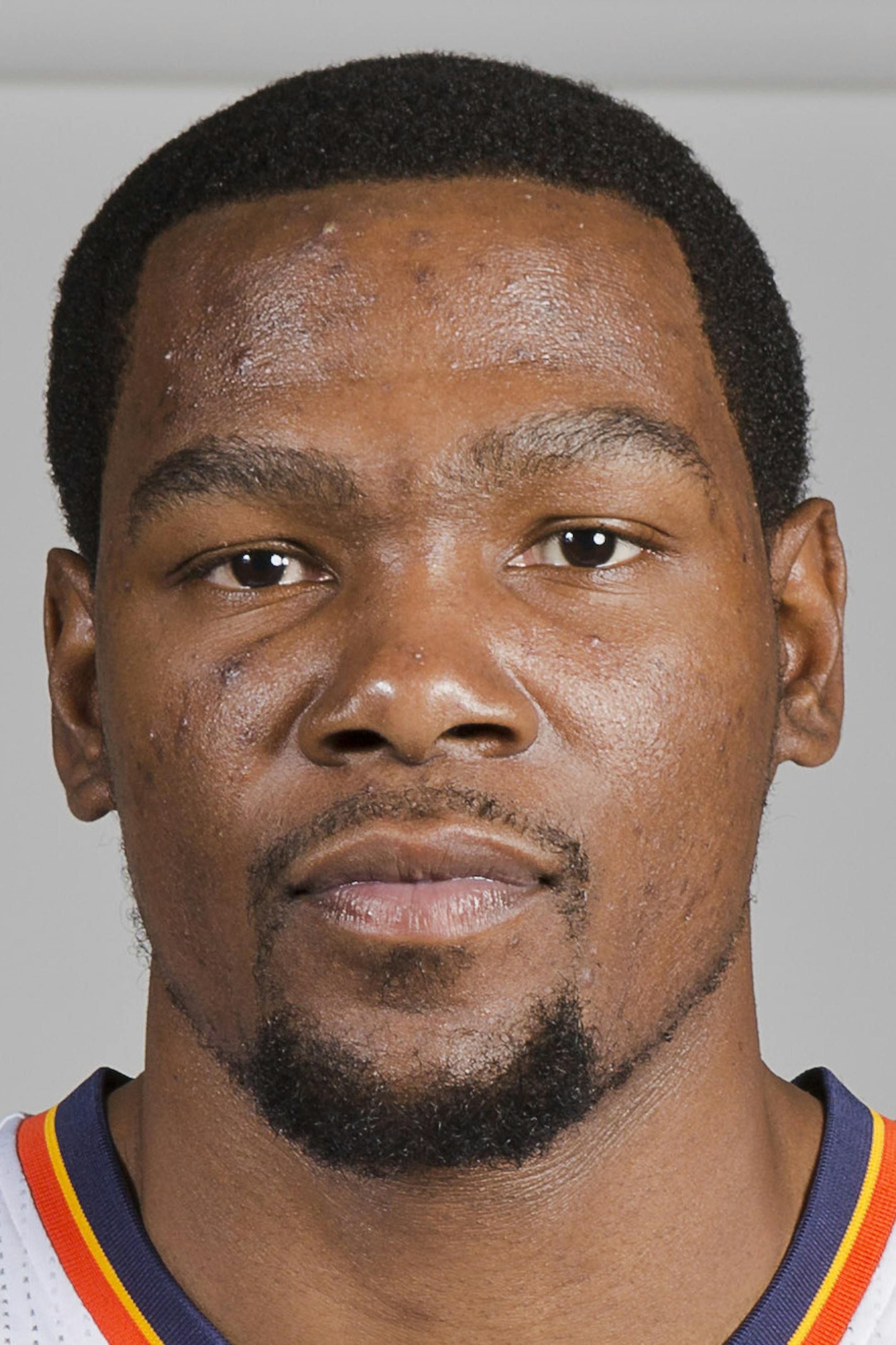 Oklahoma City Thunder's Kevin Durant poses for a photo during Thunder Media Day in Oklahoma City on Friday, Sept. 27, 2013. (AP Photo/Alonzo Adams) ORG XMIT: NYOTK