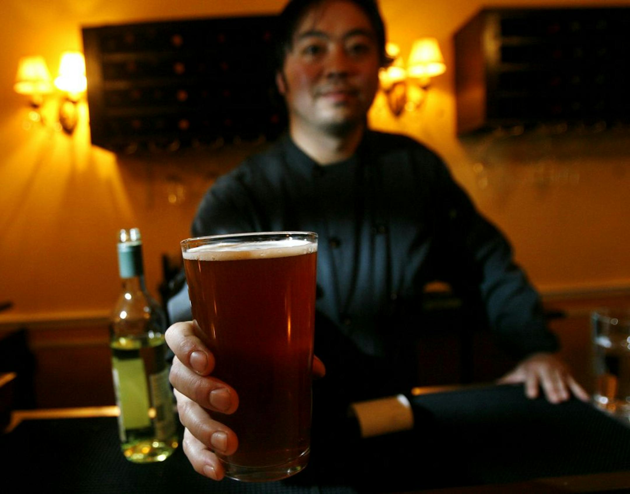 Hai Truong, owner of Ngon Vietnamese Bistro, which features a large selection of craft beers, with a draft of Lift Bridge's Drifter Pale Ale.