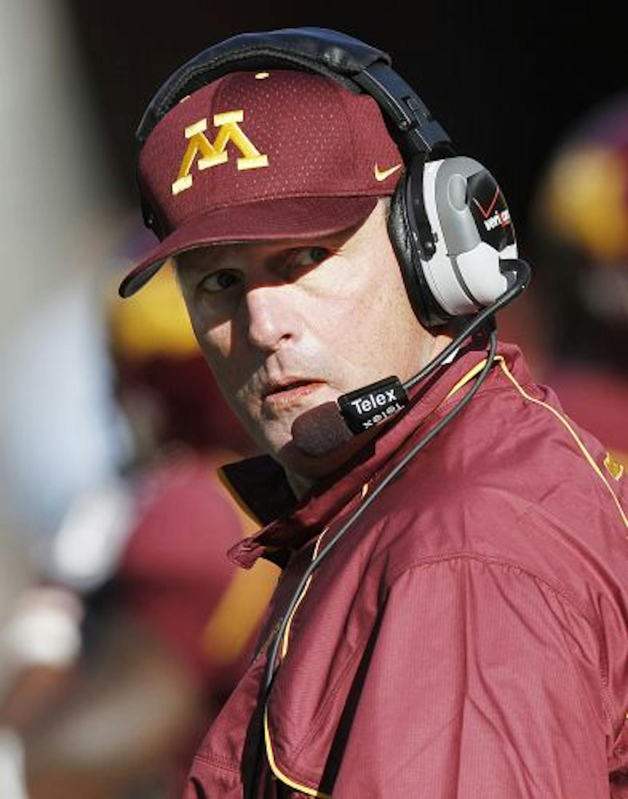 Gophers football coach Tim Brewster