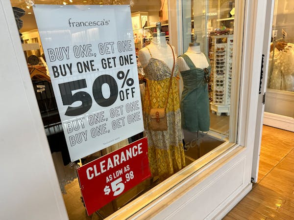 A sign trumpets discounts available in a clothing store in a mall Monday, April 29, 2024, in Lone Tree, Colo. On Wednesday, May 15, 2024, the Labor De