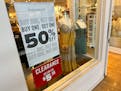 A sign trumpets discounts available in a clothing store in a mall Monday, April 29, 2024, in Lone Tree, Colo. On Wednesday, May 15, 2024, the Labor De