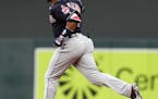 Cleveland Indians' Edwin Encarnacion rounds the bases on a three-run home run off Minnesota Twins pitcher Nik Turley in the third inning of a baseball
