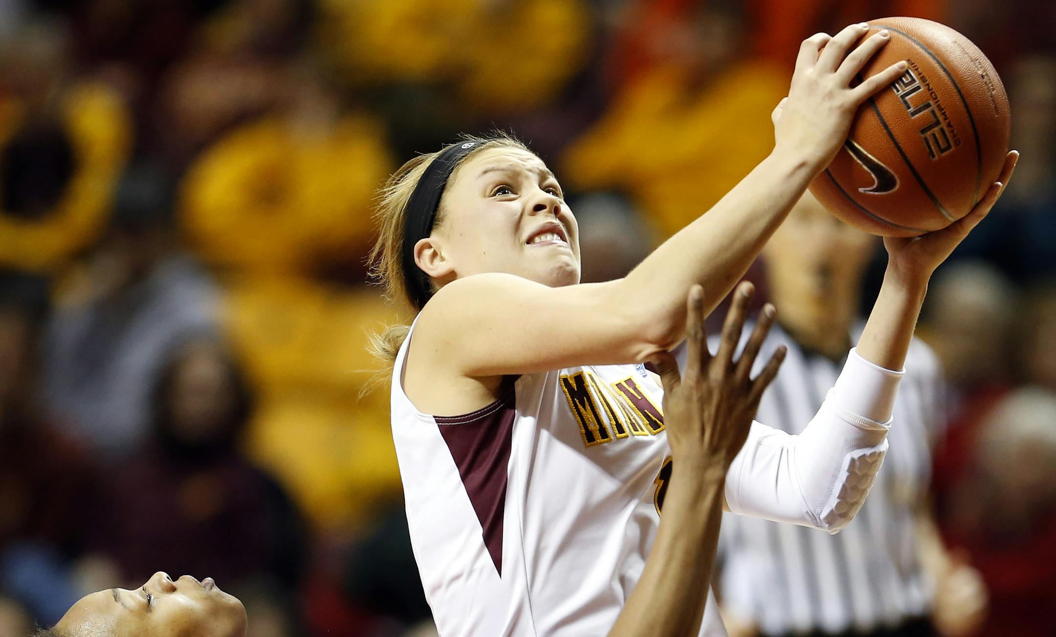 Gophers guard Rachel Banham (1) made a shot as she was fouled by Adrienne GodBold (24) in the second half. Banham finished the game with 37 points.] CARLOS GONZALEZ cgonzalez@startribune.com - January 28, 2013, Minneapolis, Minn., Williams Arena, University of Minnesota, NCAA Women’s Basketball, Minnesota Gophers vs. Illinois Fighting Illini