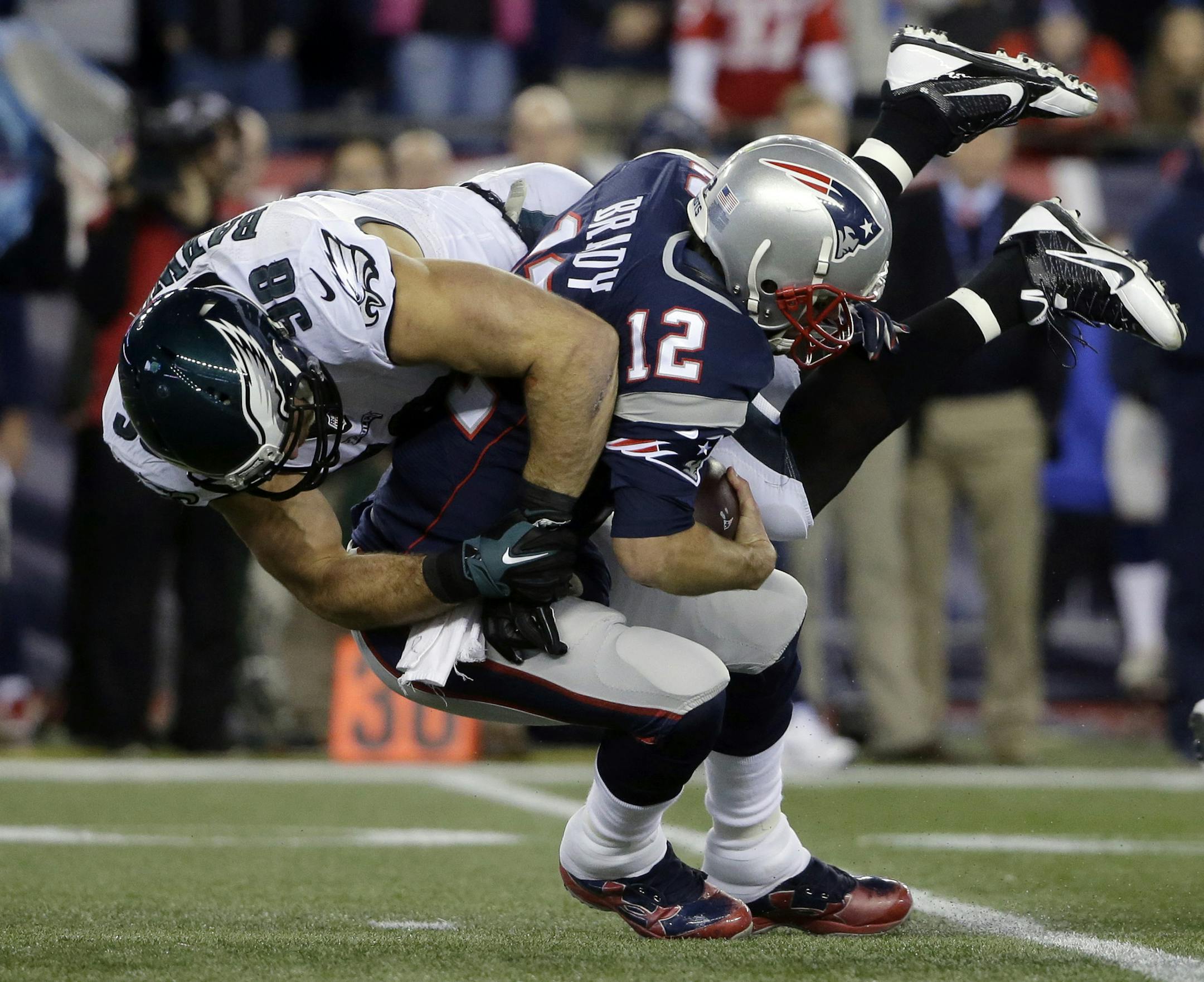Philadelphia Eagles linebacker Connor Barwin (98) sacks New England Patriots quarterback Tom Brady (12) during the first half of an NFL football game, Sunday, Dec. 6, 2015, in Foxborough, Mass. The Eagles beat the Patriots, 35-28. (AP Photo/Steven Senne)