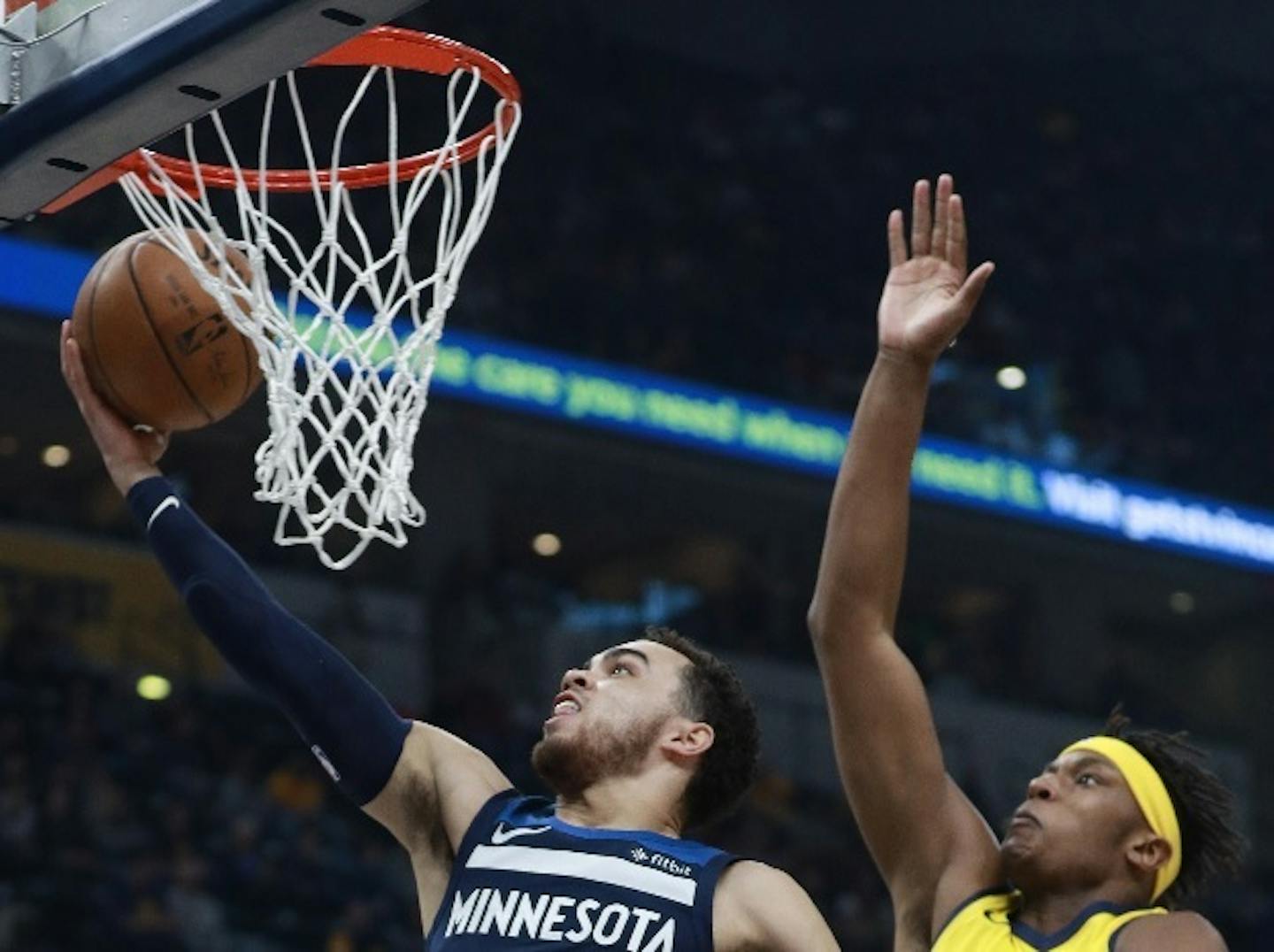 Wolves guard Tyus Jones drove for a layup past Pacers center Myles Turner in the first half Sunday.