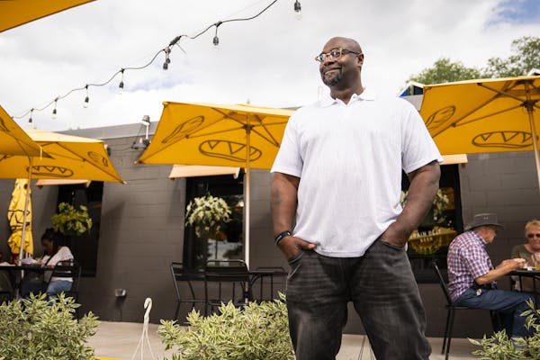 Charles Carter, owner of Taste of Rondo Bar & Grill, on the patio of the newly opened restaurant on St. Paul's Concordia Avenue.