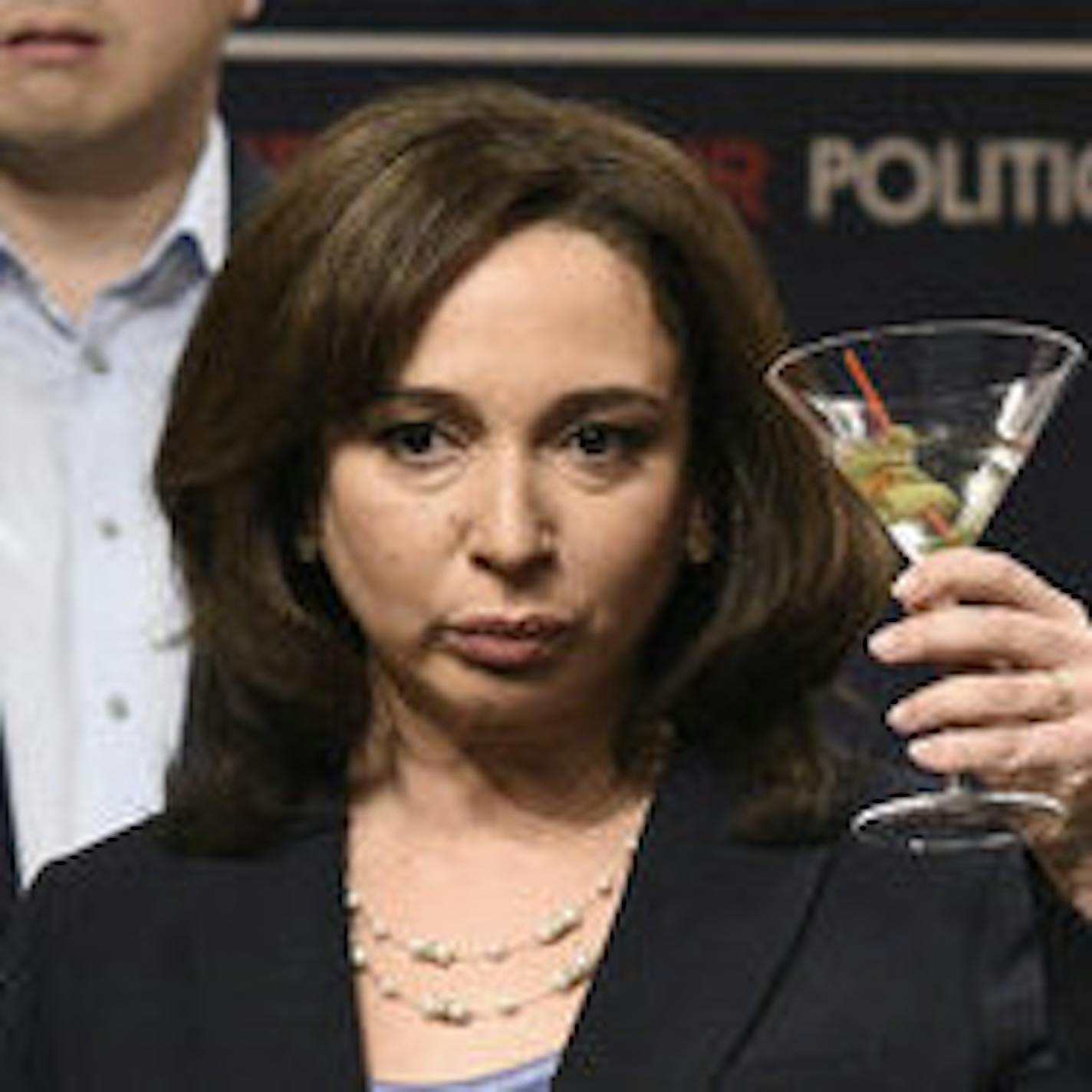 This image released by NBC shows Bowen Yang as Andrew Yang, from left, Maya Rudolph as Kamala Harris, and Colin Jost as Pete Buttigieg during the "Democratic Debate" cold open on "Saturday Night Live" on Dec. 21, 2019. Rudolph won the award for outstanding guest actress in a comedy series during the Creative Arts Emmy Awards on Saturday, Sept. 19, 2020. (Will Heath/NBC via AP)