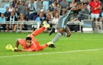 Minnesota United midfielder Kevin Molino (7) slipped a goal past San Jose Earthquakes goalkeeper Daniel Vega (17) in the final minutes of the second h
