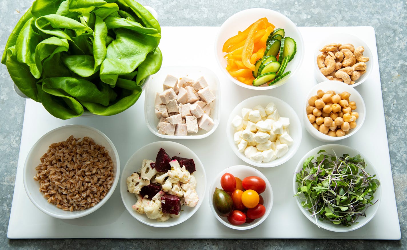 An array of fresh, local lettuce makes summer salads irresistable. Recipes from Beth Dooley, photo by Mette Nielsen, Special to the Star Tribune