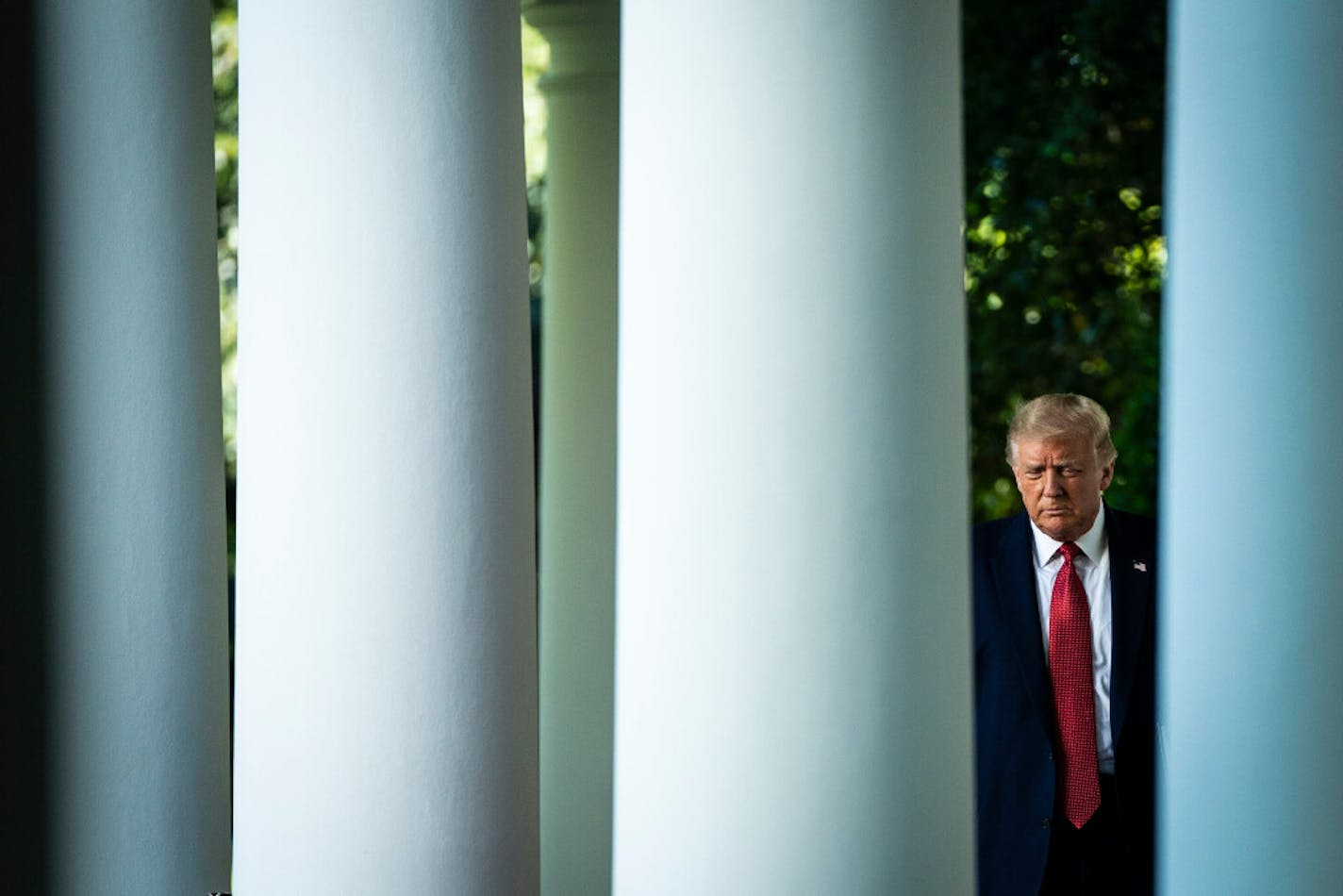 President Donald arrives to address journalists in the Rose Garden at the White House on Tuesday, July 14, 2020.