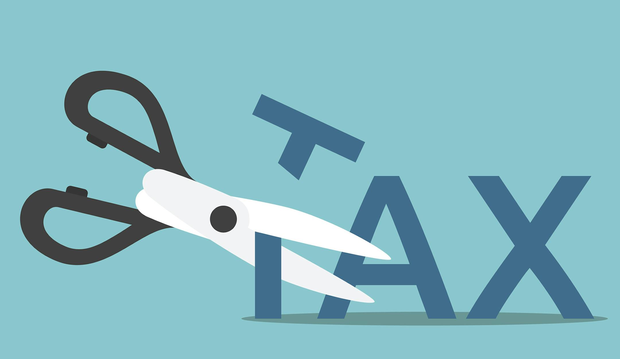 iStockphoto.com
Scissors cutting word tax.