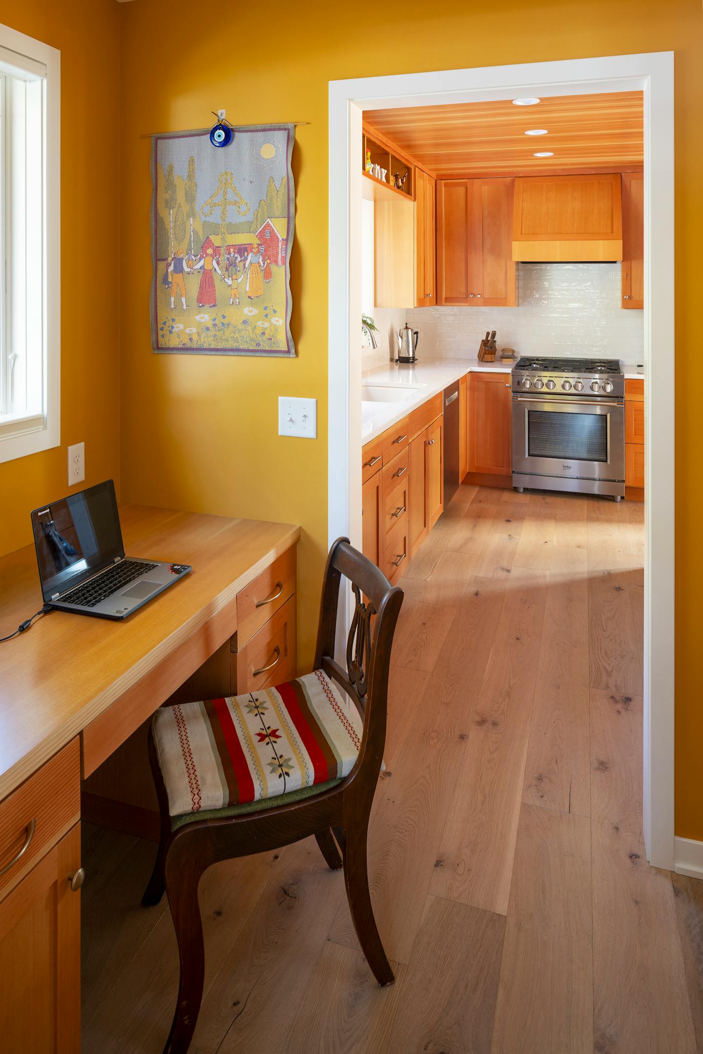 A grandmother wanted to be closer to her grandchildren, so she built a house in south Minneapolis right across the street from them. She wanted a small footprint that kept aging in place — and play spaces for the grandkids — in mind. The result is an energy-efficient house that also gives a nod to the homeowner’s Swedish heritage with a red exterior, decorative railings, richly stained woods and a blue tile fireplace surround. Meanwhile, a skylit loft serves as a playroom for the grandkids in this modern take on traditional Scandinavian design.