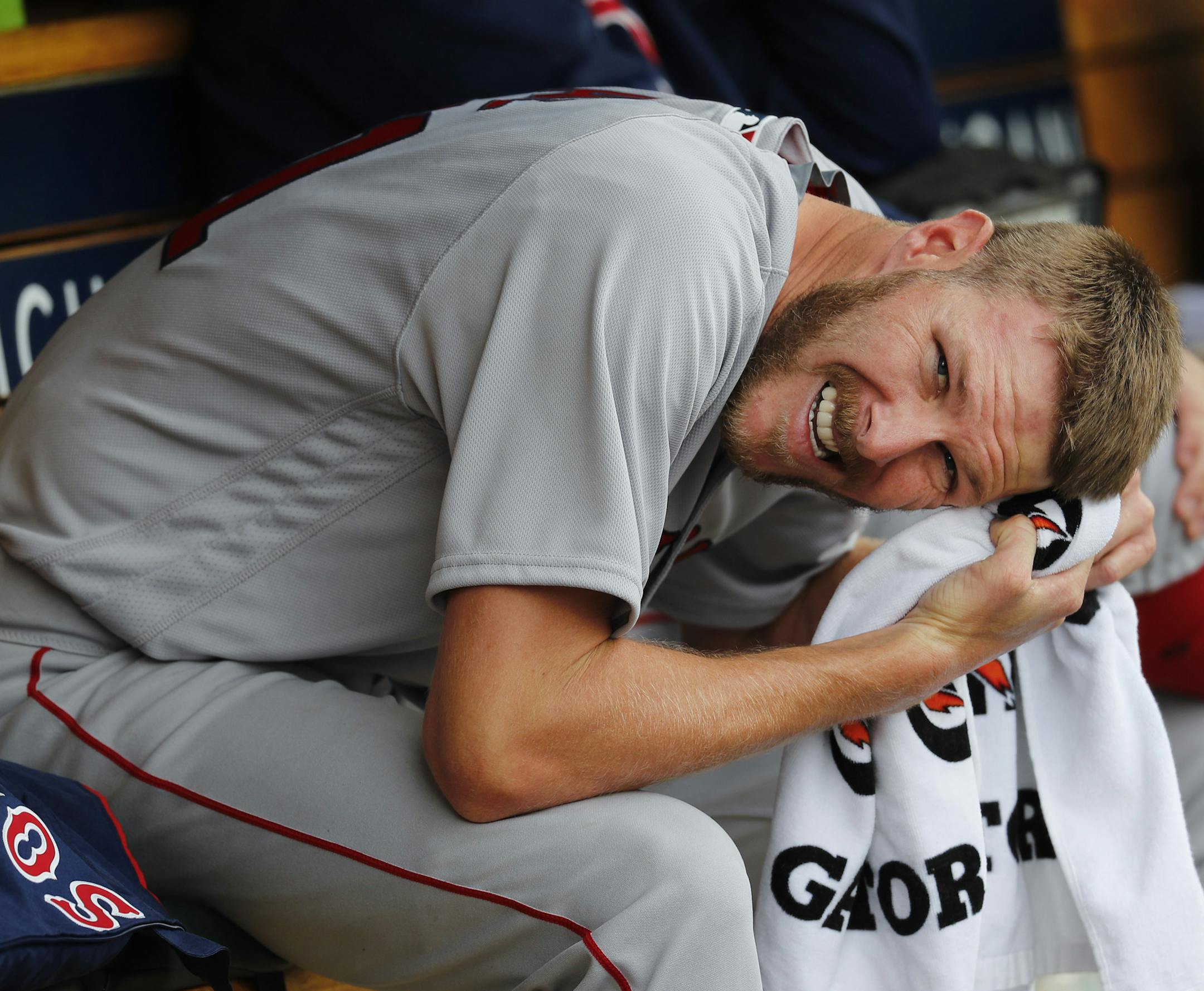 Boston Red Sox pitcher Chris Sale wipes his head on the bench after being pulled against the Detroit Tigers in the eighth inning of a baseball game in Detroit, Monday, April 10, 2017. Detroit won 2-1. (AP Photo/Paul Sancya)