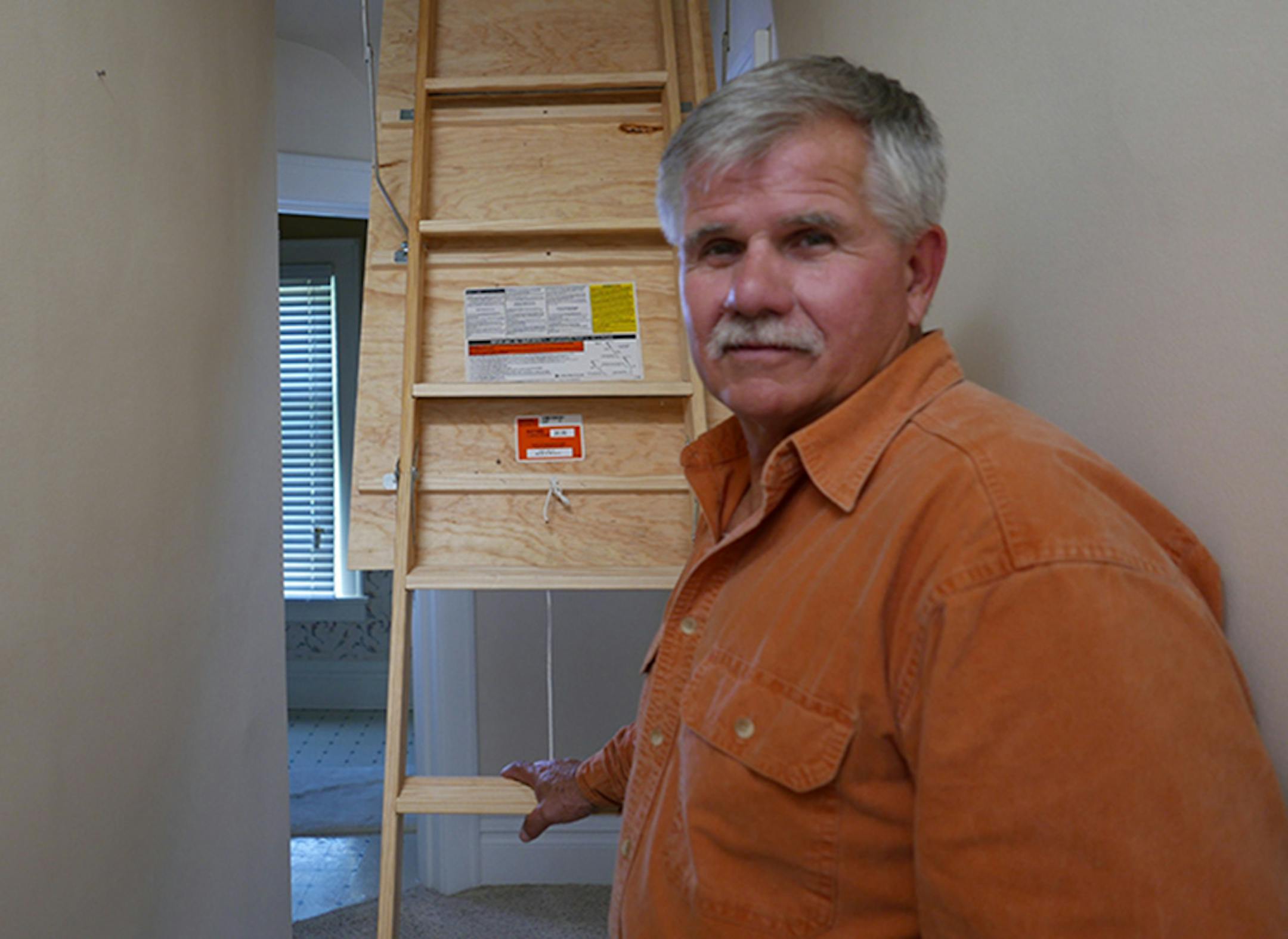 Kim Bokovoy and contractor Tom Silva, pictured, replaced the attic staircase in her Mpls. home in an episode of "Ask This Old House," Provided
