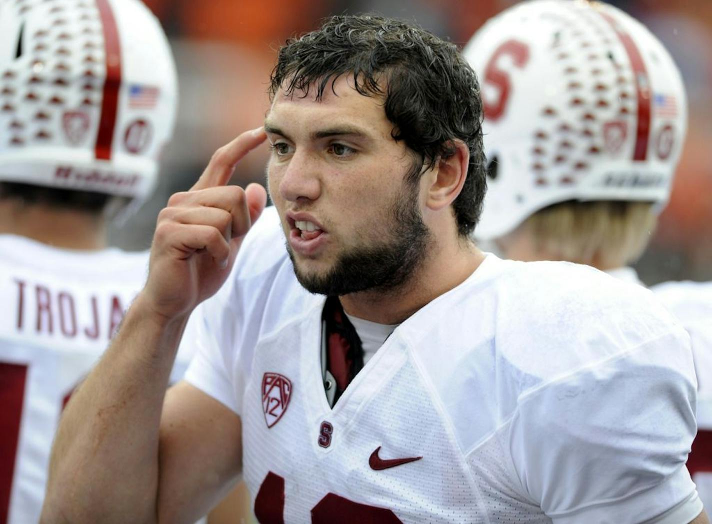 Stanford quarterback Andrew Luck (12) signals to his teammates during the second half of an NCAA football game against Oregon State in Corvallis, Ore., Saturday, Nov. 5, 2011.