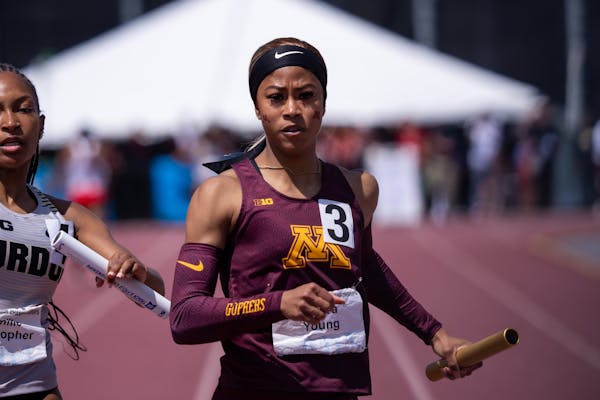 Amira Young, above at the Big Ten meet last year, set a program record in the 100 on Saturday. She will be in the 100 and 200 finals on Sunday.
