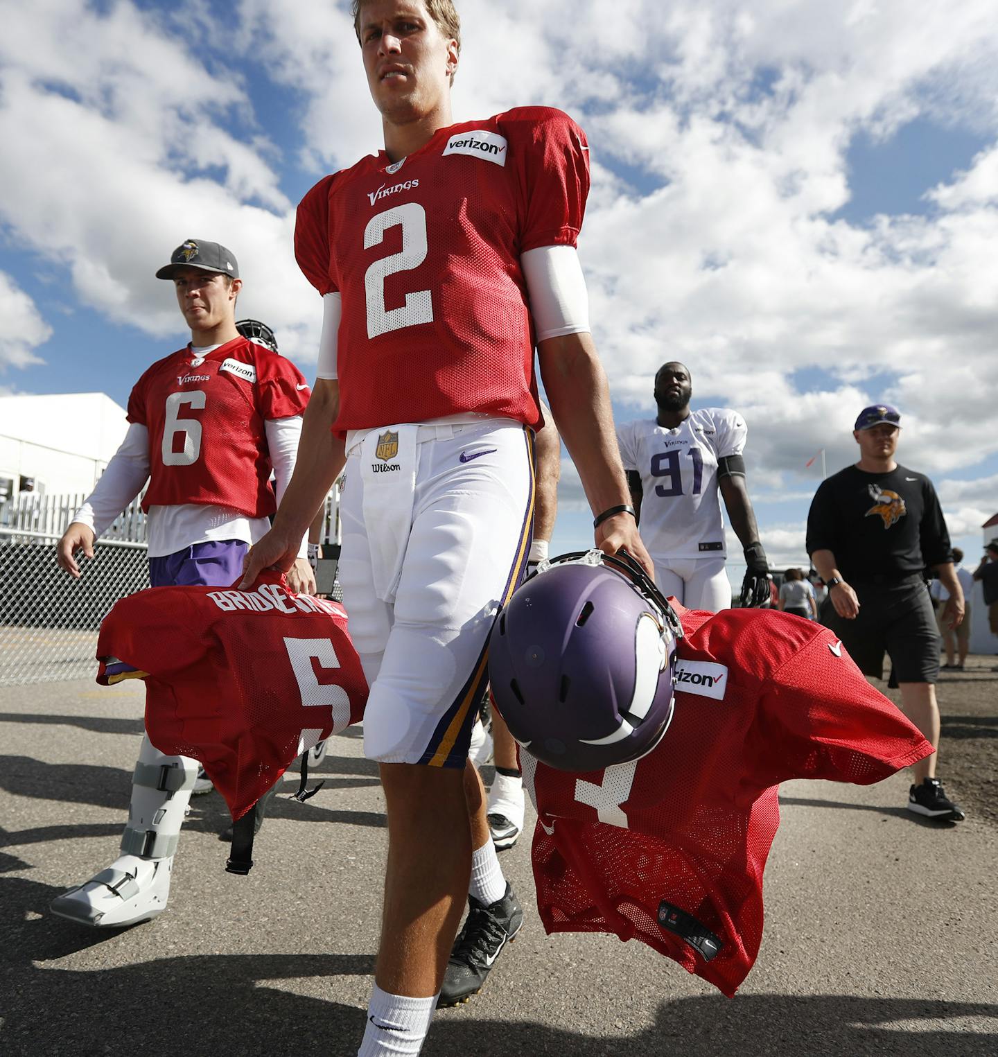 Vikings rookie quarterback Joel Stave carried equipment for veterans Shaun Hill (6) and Teddy Bridgewater after practice on Aug. 5, 2016 in Mankato.
JERRY HOLT jerry.holt@startribune.com