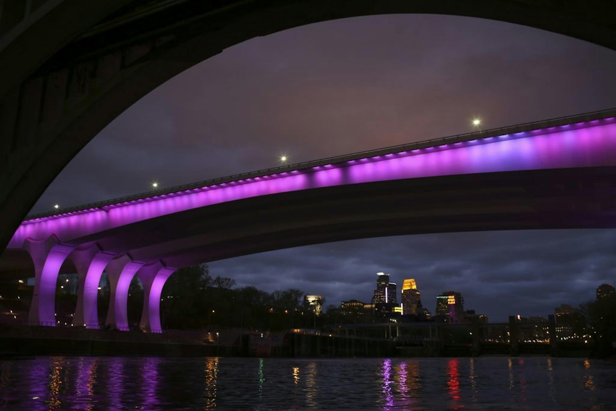 The I-35W bridge was bathed in purple Thursday night in a memorial to Prince.