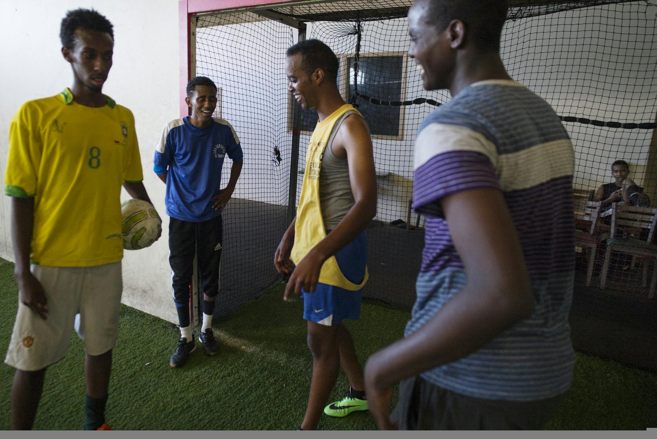 On September 21, 2014 in Minneapolis at Twin Cities Indoor Sports, players take a break during practice. Female soccer head coach Hani Haybe engages Somali youths outside of school as a first line of defense against recruitment by militant groups overseas.]Richard Tsong-Taatarii/rtsong- taatarii@startribune.com