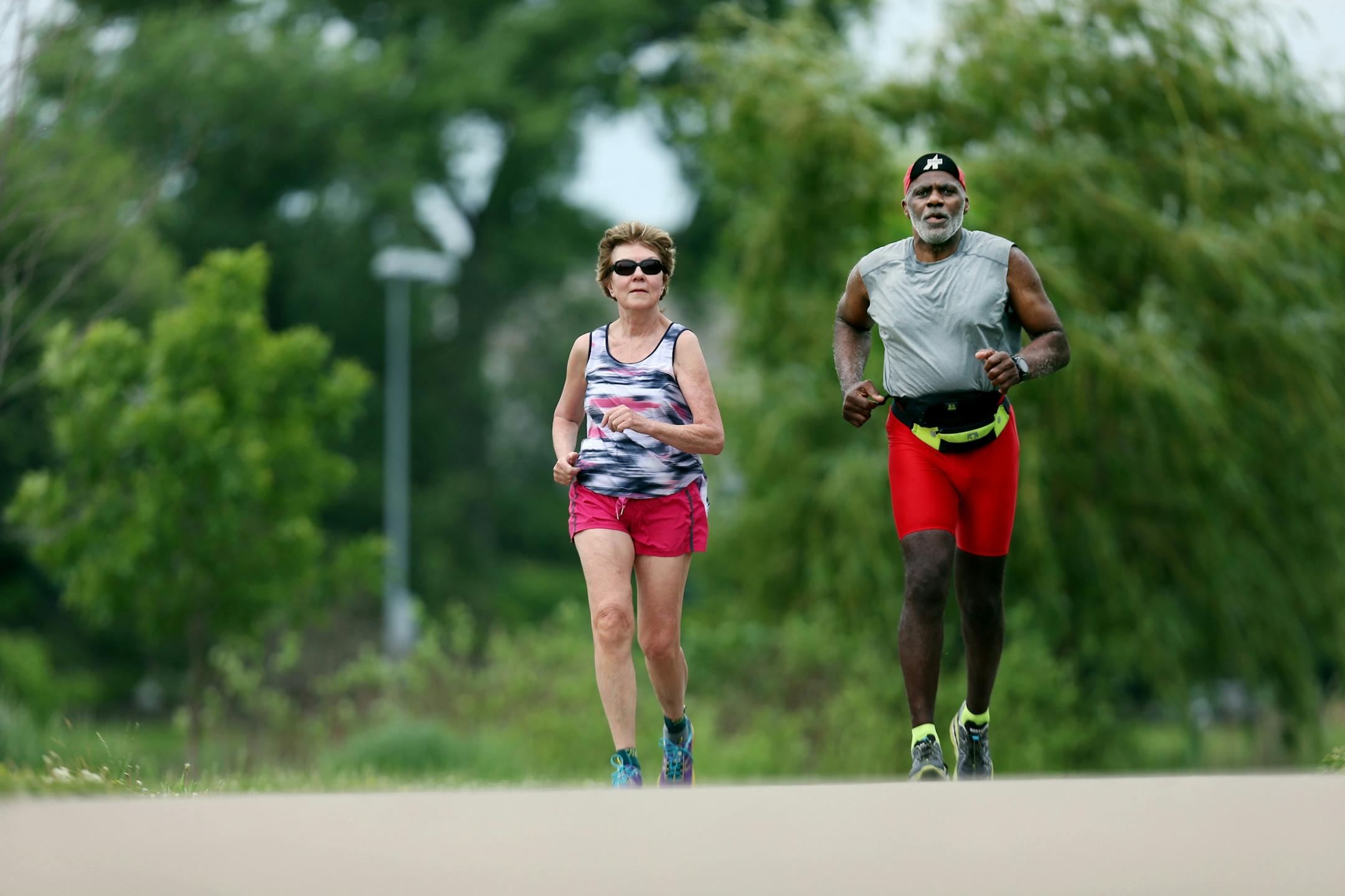 Minnesota Supreme Court Associate Justice Alan Page and his wife Diane Page took a recent 6 am run around Lake of Isle in Minneapolis, MN. Justice Page will hit the mandatory retirement age of 70 in August.