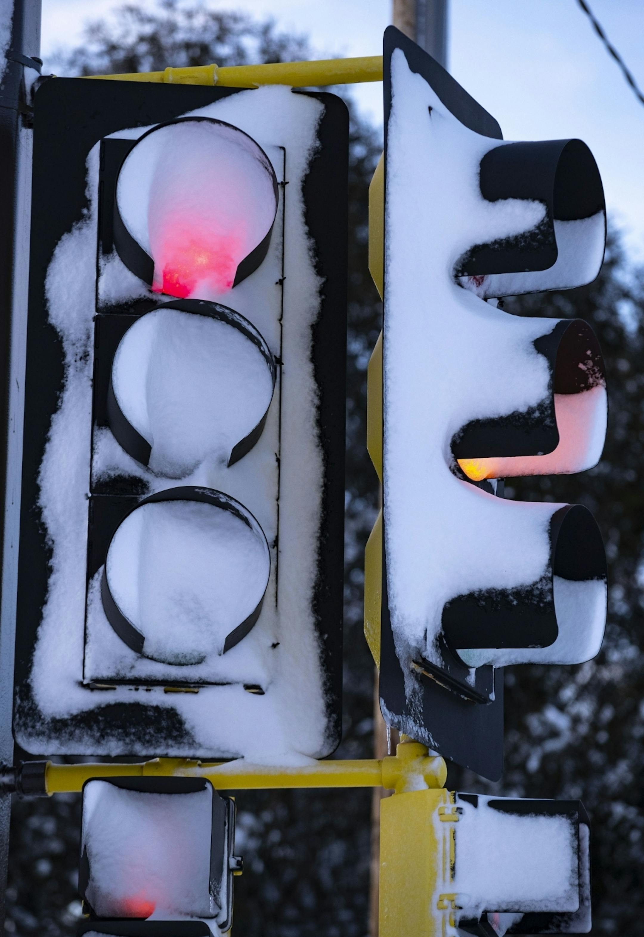 Stoplights were covered in snow in downtown Duluth, MN on Sunday afternoon.