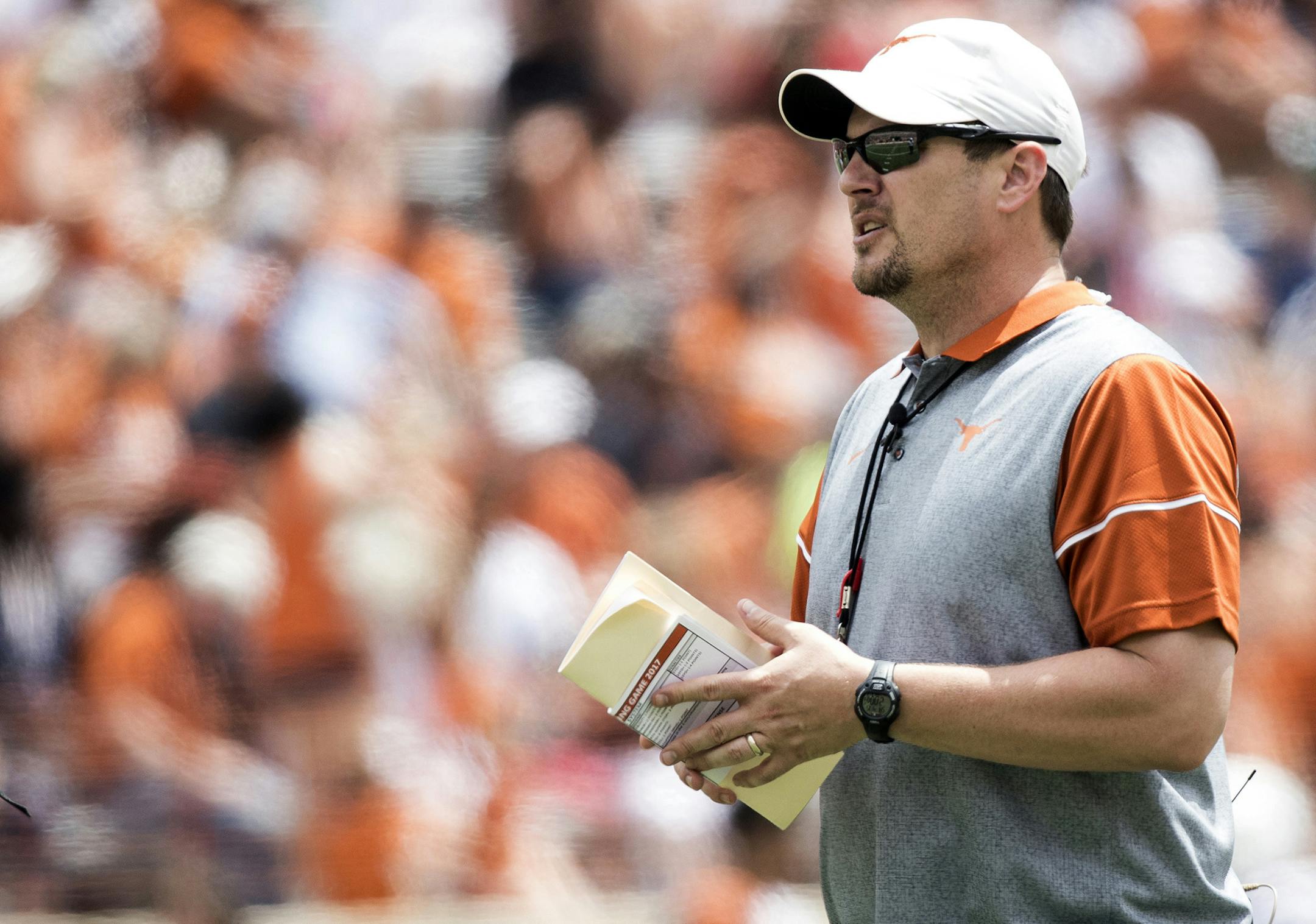 FILE - In this April 15, 2017, file photo, Texas head coach Tom Herman looks on during the Orange and White spring NCAA college football game in Austin, Texas. (Ricardo B. Brazziell/Austin American-Statesman via AP, File) ORG XMIT: MIN2017082520104395