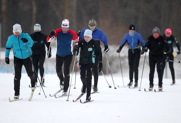 Avid cross country skier and coach Kate Ellis will be competing in the Masters World Cup at Theodore Wirth in late January. Here, Ellis, center, was s