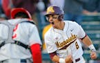 Minnesota's Micah Coffey (8) celebrates the go-ahead and eventual game-winning run on a past ball during the sixth inning against Ohio State at Sieber