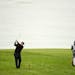 Phil Mickelson plays an approach shot on the 11th hole as his caddie looks on during the third round of the U.S. Open at Pebble Beach Golf Links on Sa