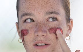 New Prague's Hailee Ullom preps for the Class 4A final against Rogers.