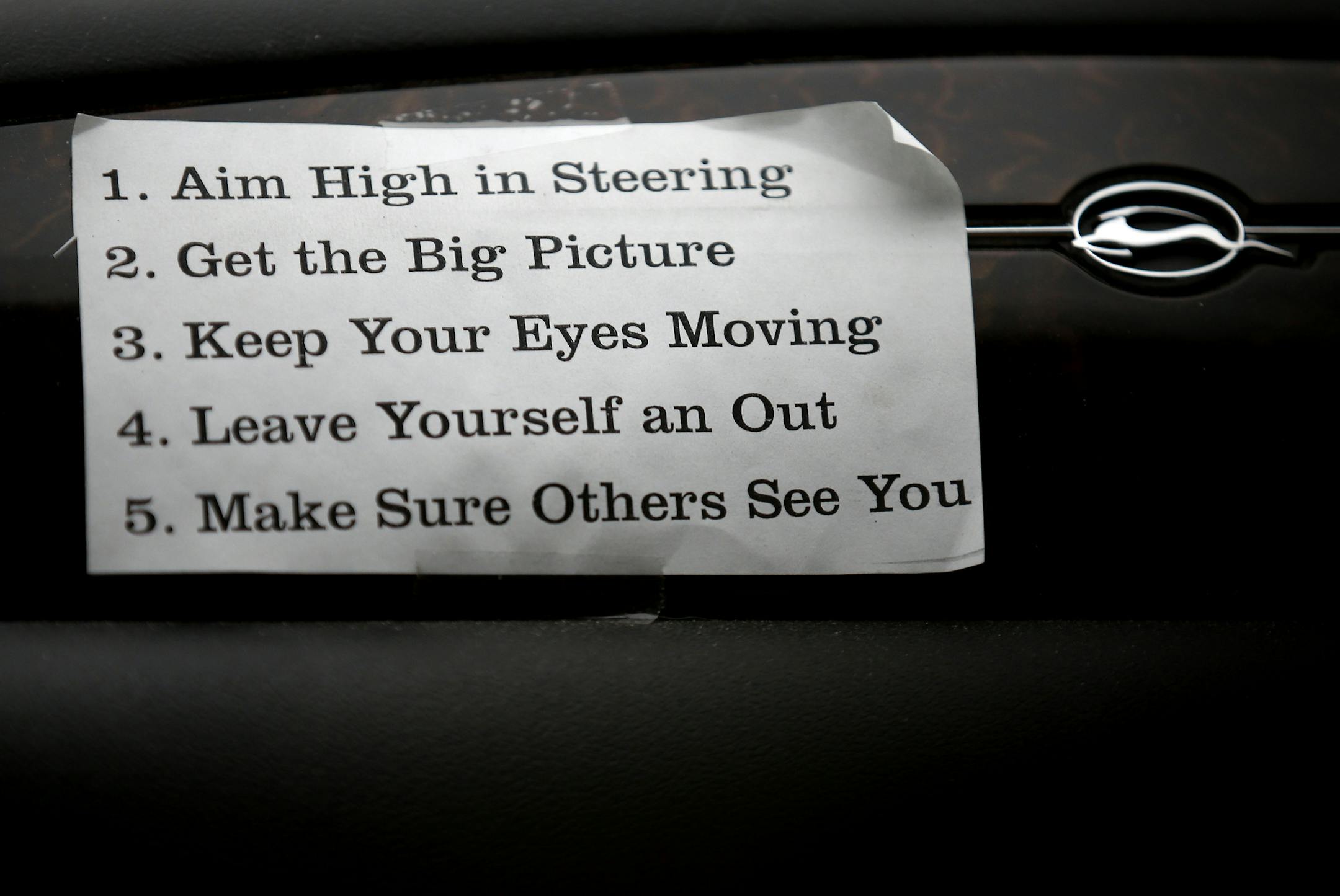 Five points were displayed on the passenger side dashboard of a student driver's car at Highland Park High School in St. Paul. ] CARLOS GONZALEZ cgonzalez@startribune.com - November 24, 2014, St. Paul, Minn., Highland Park High School, teenage drivers under age 18 will have to spend a minimum of 10 more hours behind the wheel while being supervised by an adult and submit written documentation of those hours under a new law that go into effect on Jan. 1.