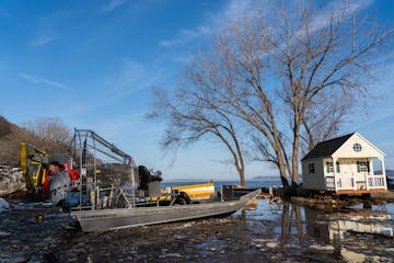 Boat operator Bill Chelmowski navigated his airboat out of Camp LaCupolis on the south end of Lake Pepin on Thursday. The airboat has a strengthened h