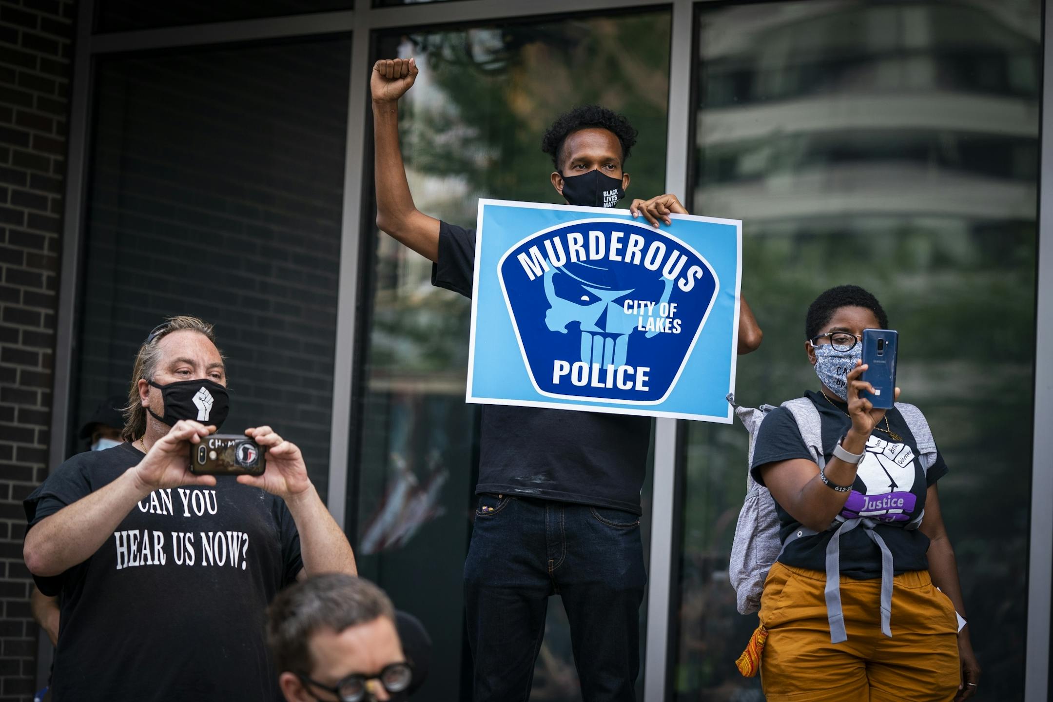 Protesters rallied in front of Minneapolis Police Department's First Precinct.