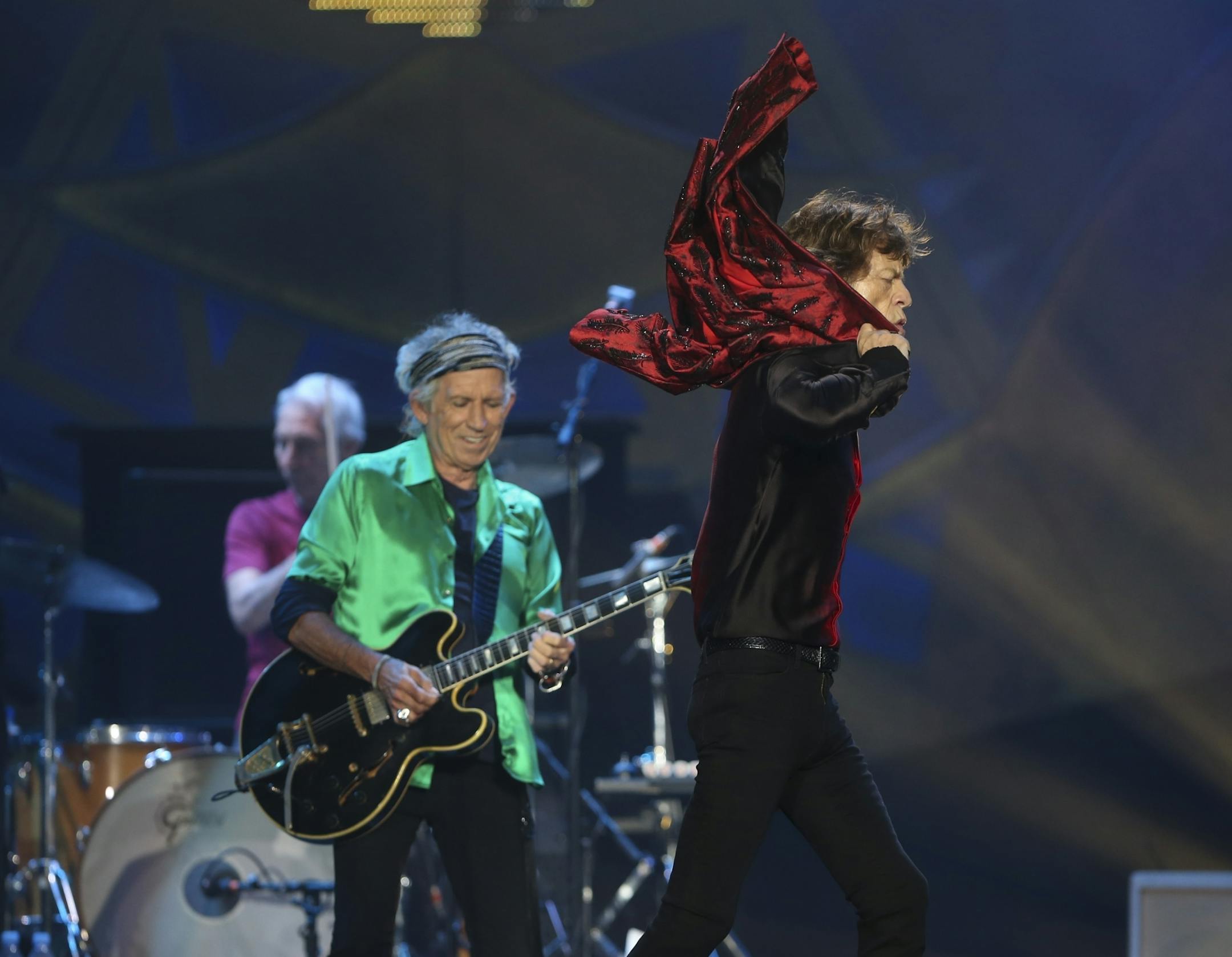 Mick Jagger strutted past guitarist Keith Richards after taking off his jacket early in the Rolling Stones' show at TCF Bank Stadium Wednesday night.