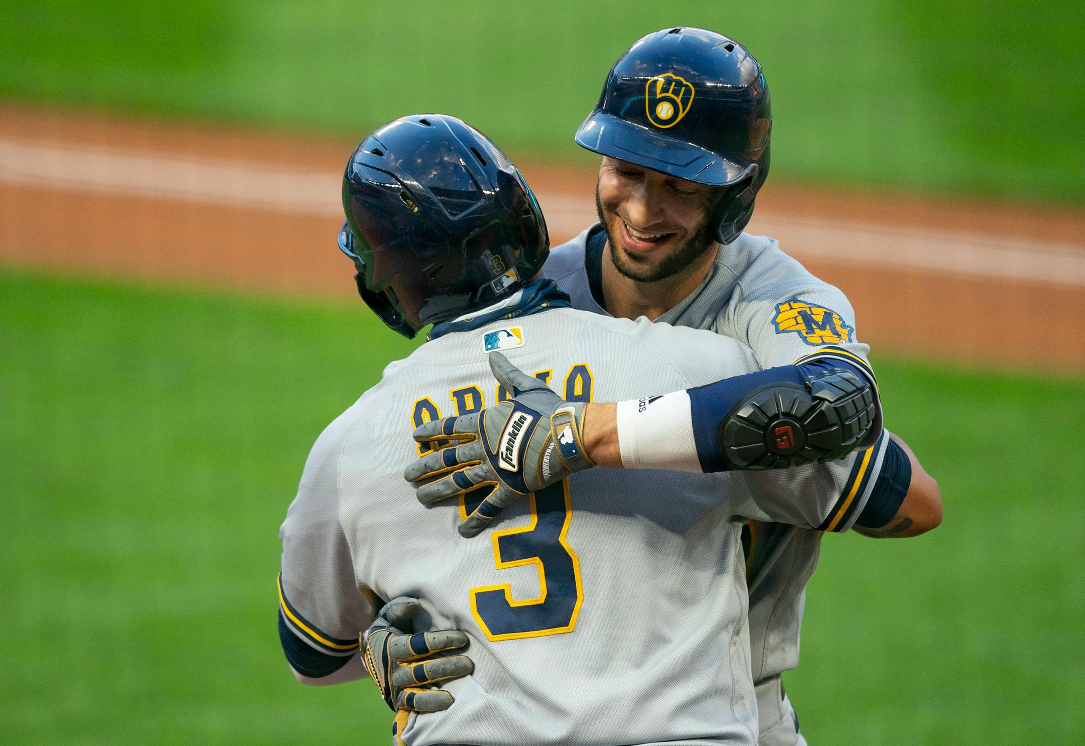 Brewers right fielder Ryan Braun was embraced by shortstop Orlando Arcia after Braun hit a two-run home run in the third inning.