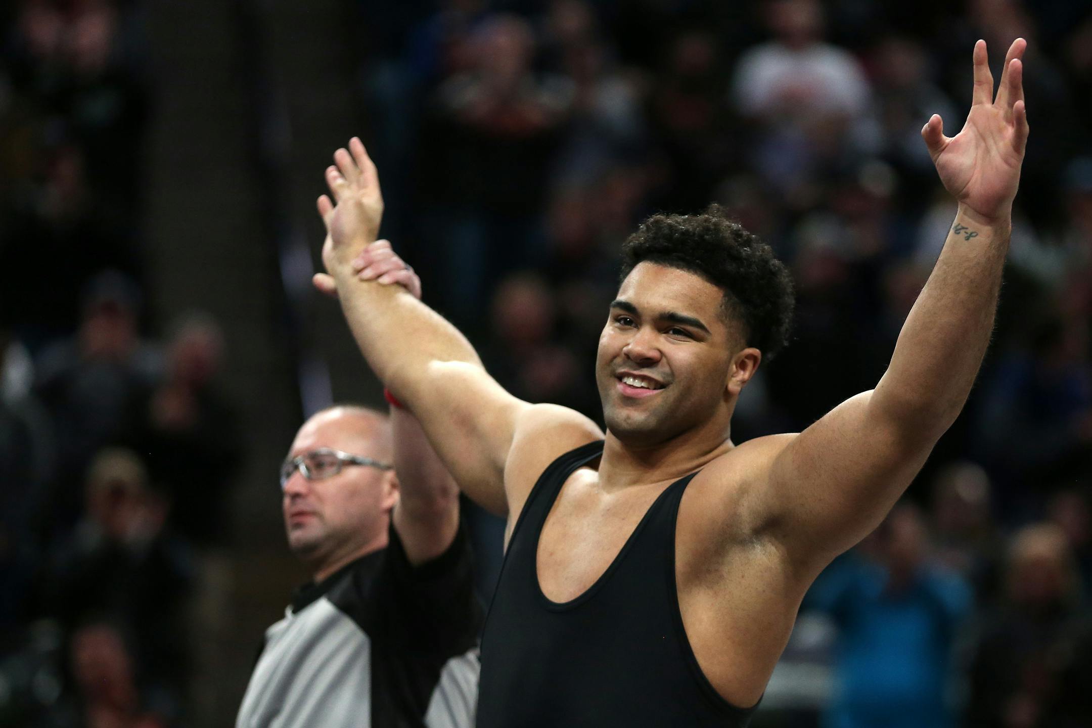 Apple Valley's Gable Steveson celebrated after defeating Anoka's Brandon Frankfurth in the Class 3A heavyweight championship match.